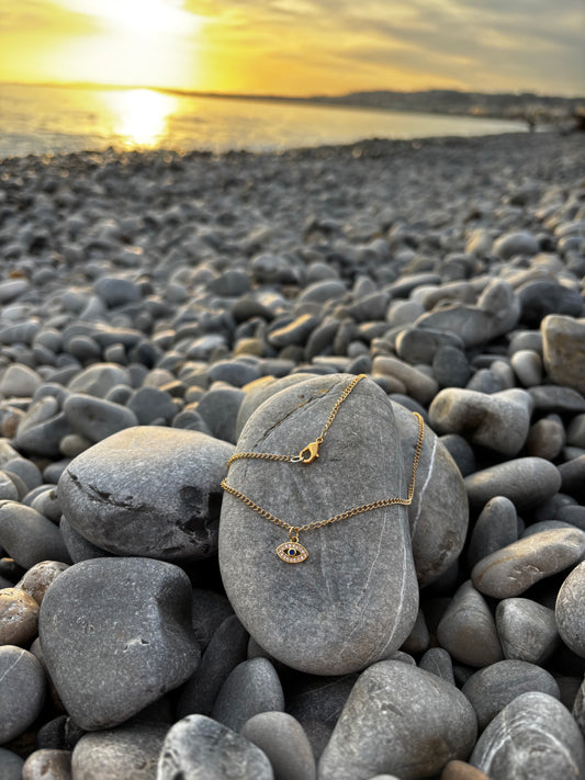 Collier en acier inoxydable doré œil de protection.